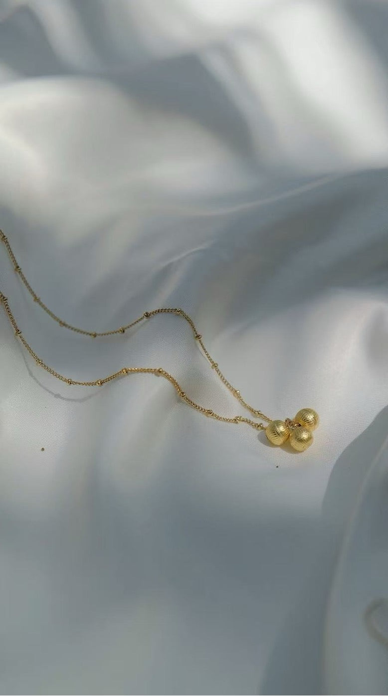 Eternal Triple-Strand Necklace