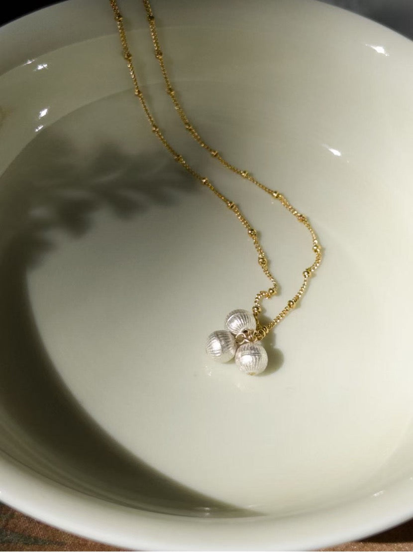 Eternal Triple-Strand Necklace