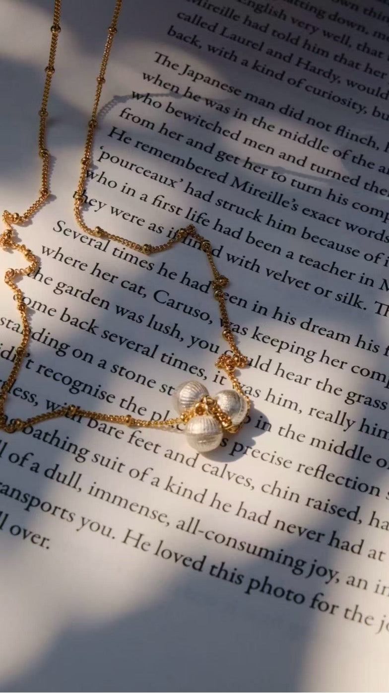 Eternal Triple-Strand Necklace